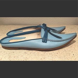 Light blue leather slides w/dark blue accent ties. Finely crafted, Made in Italy